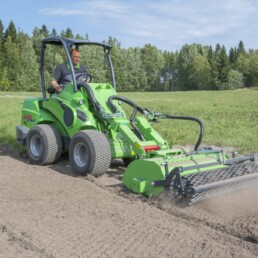 grondfrees kniklader met rol